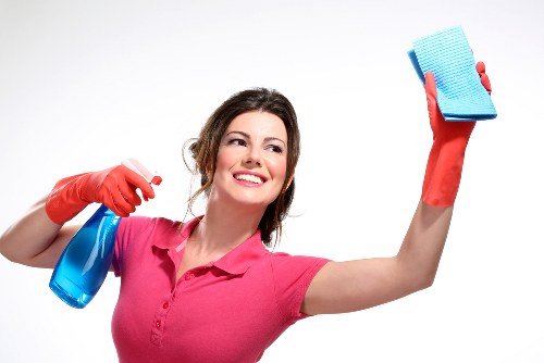 Technician performing deep carpet cleaning in a Bickley workspace